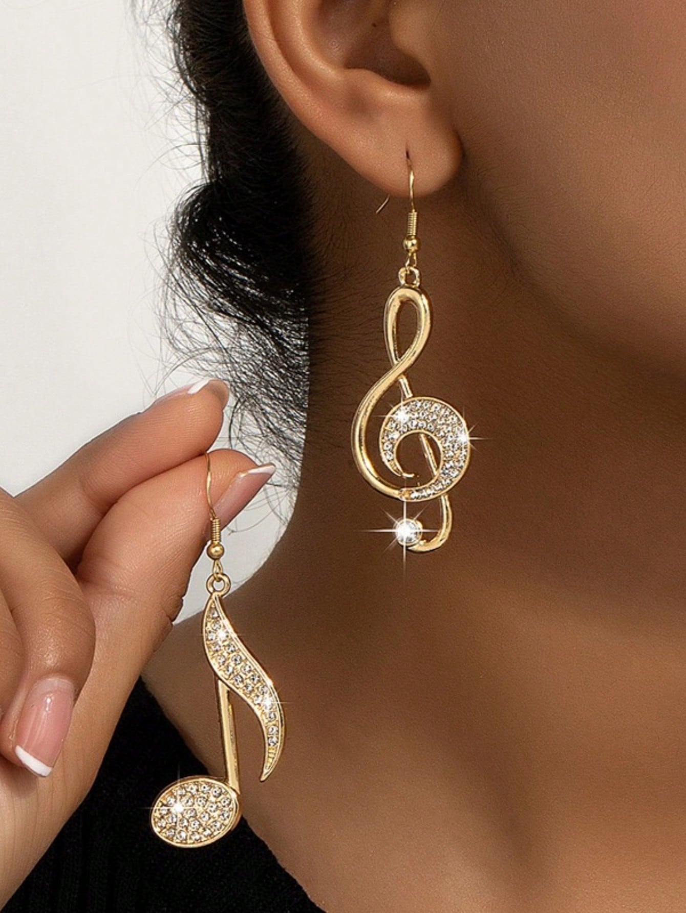 Elegant gold music note earrings for music lovers

Trendy gold earrings with musical note design

Dainty music note earrings for women and girls

Gold-plated music-themed earrings for stylish outfits

Minimalist musical note studs for everyday wear

Statement earrings for musicians and music fans

Unique gold earrings with treble clef or note charm